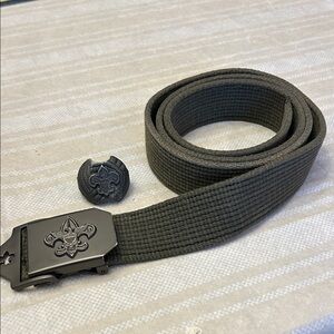 Boy Scout Belt with Buckle and a Boy Scout neckerchief slide.
